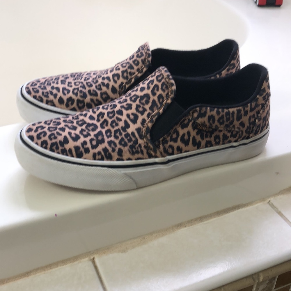 Leopard print vans.
